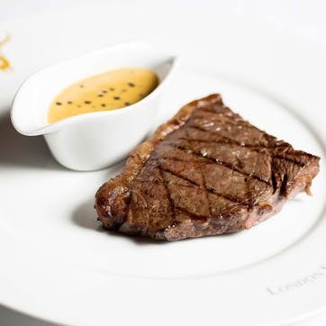 Theatre Tickets to The Lion King and Two Course Dining Experience with Cocktail at Marco Pierre White's London Steakhouse Co for Two