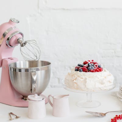 Pink KitchenAid making the fluffiest meringue