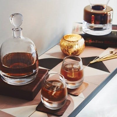 glasses and decanters with coasters